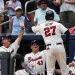 Atlanta Braves' Matt Kemp (27) celebrates with hitting coach Kevin Seitzer (28), left and manager Brian Snitker (43) after hitting a three-run home run in the third inning of a baseball game against the Arizona Diamondbacks, Sunday, July 16, 2017, in Atlanta. The Braves won 7-1. (AP Photo/John Bazemore)