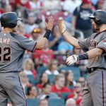Arizona Diamondbacks' Paul Goldschmidt, right, is congratulated by teammate Jake Lamb (22) after hitting a two-run home run during the fourth inning of a baseball game against the St. Louis Cardinals, Saturday, July 29, 2017, in St. Louis. (AP Photo/Jeff Roberson)