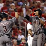 Arizona Diamondbacks' Ketel Marte, right, is congratulated by teammate Daniel Descalso after hitting a two-run home run during the eighth inning of a baseball game against the St. Louis Cardinals, Saturday, July 29, 2017, in St. Louis. (AP Photo/Jeff Roberson)