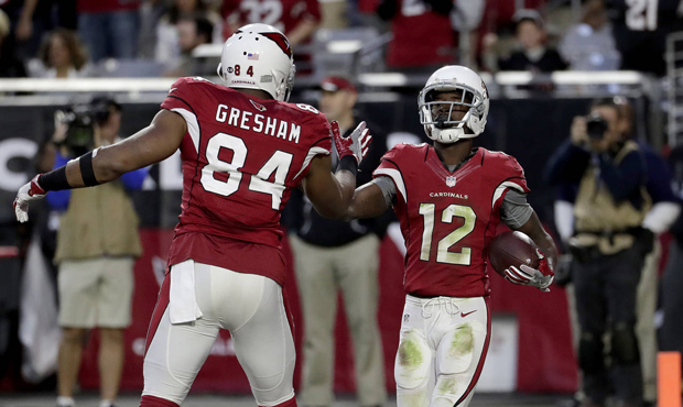 Arizona Cardinals wide receiver John Brown (12) celebrates his touchdown with tight end Jermaine Gr...
