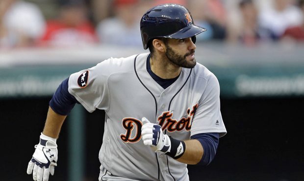 Detroit Tigers' J.D. Martinez watches his RBI single off Cleveland Indians starting pitcher Carlos ...