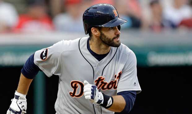Detroit Tigers' J.D. Martinez watches his RBI single off Cleveland Indians starting pitcher Carlos ...