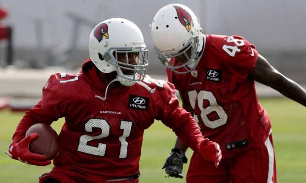 Arizona Cardinals Patrick Peterson (21) runs drills during an NFL football organized team activity,...