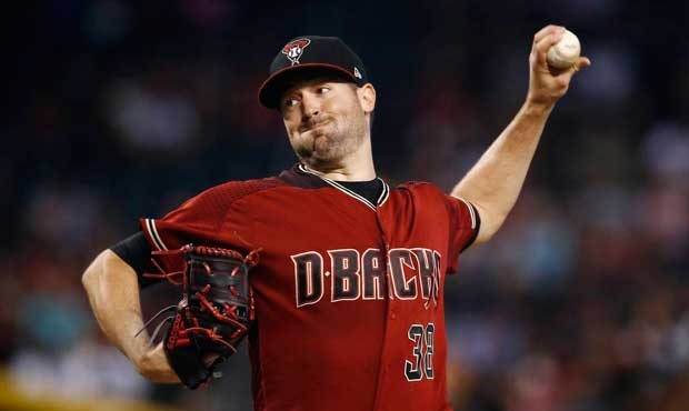 Arizona Diamondbacks' Robbie Ray throws a pitch against the Washington Nationals during the first i...