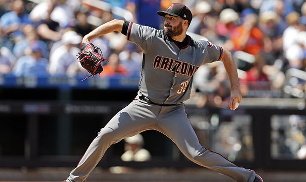 Arizona Diamondbacks pitcher Robbie Ray delivers a pitch during the fourth inning of a baseball gam...