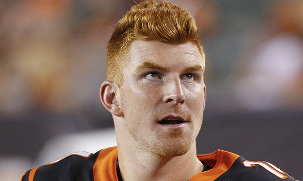 Cincinnati Bengals quarterback Andy Dalton stands on the sidelines in the second half of an NFL pre...