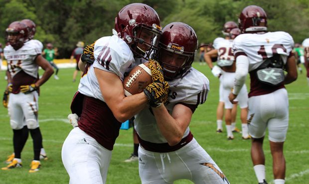 Two ASU defenders practice tackling drills during the first day of Camp Tontozona. (Photo by Asia W...