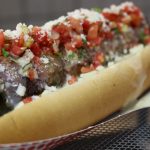 The Cardinals introduced a "Cardiac Cards Dog," an all-beef hot dog wrapped in a Smash Burger patty, wrapped again in bacon and topped with queso, pico de gallo and cojita cheese. (Matt Layman/Arizona Sports)