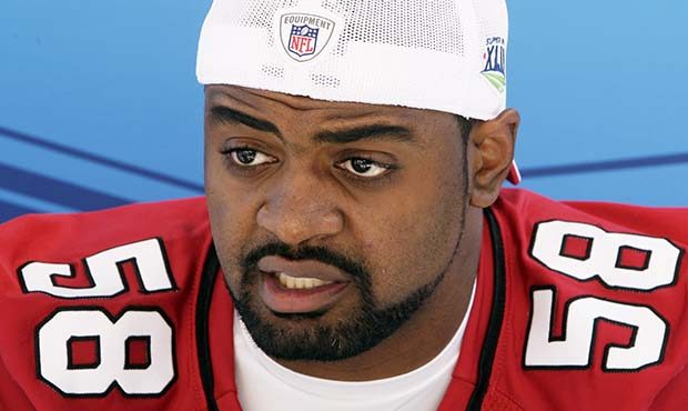 This Jan. 27, 2009 file photo shows Arizona Cardinals linebacker Karlos Dansby speaking to reporter...