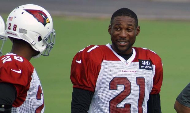 Cornerbacks Patrick Peterson and Justin Bethel laugh during a training camp practice Aug. 1. (Photo...