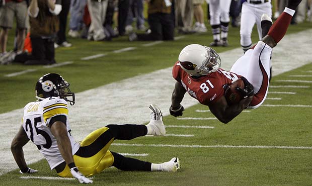 Arizona Cardinals wide receiver Anquan Boldin (81) makes a reception as Pittsburgh Steelers safety Ryan Clark (25) watches during the second quarter of the NFL Super Bowl XLIII football game, Sunday, Feb. 1, 2009, in Tampa, Fla. (AP Photo/Matt Slocum)