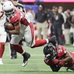 Arizona Cardinals running back James Summers (45) is tripped up by Atlanta Falcons defensive end Chris Odom (93) during the second half of an NFL football game, Saturday, Aug. 26, 2017, in Atlanta. (AP Photo/David Goldman)