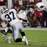 Arizona Cardinals wide receiver Marquis Bundy (18) is hit by Oakland Raiders defensive back Anthony Cioffi (37) during the second half of an NFL preseason football game, Saturday, Aug. 12, 2017, in Glendale, Ariz. (AP Photo/Rick Scuteri)