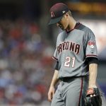 Arizona Diamondbacks pitcher Zack Greinke heads to the dugout after giving up five runs in the fourth inning of a baseball game against the Minnesota Twins pm Saturday, Aug. 19, 2017, in Minneapolis. (AP Photo/Jim Mone)