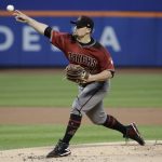 Arizona Diamondbacks' Zack Godley (52) delivers a pitch during the first inning of a baseball game against the New York Mets Wednesday, Aug. 23, 2017, in New York. (AP Photo/Frank Franklin II)