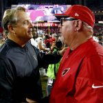 Arizona Cardinals coach Bruce Arians, right, greets Oakland Raiders coach Jack Del Rio after an NFL preseason football game, Saturday, Aug. 12, 2017, in Glendale, Ariz. The Cardinals won 20-10. (AP Photo/Ross D. Franklin)