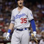 Los Angeles Dodgers Cody Bellinger reacts to a called third strike, during the fourth inning of the team's baseball game against the Arizona Diamondbacks on Wednesday, Aug. 9, 2017, in Phoenix. (AP Photo/Matt York)