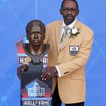 Kenny Easley poses with his but during an induction ceremony at the Pro Football Hall of Fame on Saturday, Aug. 5, 2017, in Canton, Ohio. (AP Photo/Ron Schwane)