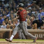 Arizona Diamondbacks' Jake Lamb watches his two RBI double during the sixth inning of a baseball game against the Chicago Cubs Wednesday, Aug. 2, 2017, in Chicago. (AP Photo/Paul Beaty)