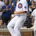 Chicago Cubs' Jon Lester (34) scores during the second inning of a baseball game against the Arizona Diamondbacks on Tuesday, Aug. 1, 2017, in Chicago. (AP Photo/Matt Marton)