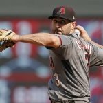 Arizona Diamondbacks infielder Daniel Descalso pitches in relief against the Minnesota Twins in the eighth inning of a baseball game, Sunday, Aug. 20, 2017, in Minneapolis. The Twins won 12-5. (AP Photo/Jim Mone)