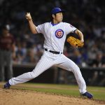 Chicago Cubs closing pitcher Koji Uehara, of Japan, throws during the ninth inning of the team's baseball game against the Arizona Diamondbacks on Wednesday, Aug. 2, 2017, in Chicago. (AP Photo/Paul Beaty)