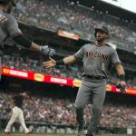 Arizona Diamondbacks' David Peralta (6) scores on Paul Goldschmidt's sacrifice fly against the San Francisco Giants during the first inning of a baseball game on Saturday, Aug. 5, 2017, in San Francisco. (AP Photo/D. Ross Cameron)