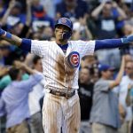 Chicago Cubs' Javier Baez celebrates after scoring on a single by Willson Contreras during the seventh inning of a baseball game against the Arizona Diamondbacks, Thursday, Aug. 3, 2017, in Chicago. (AP Photo/Nam Y. Huh)