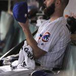 Chicago Cubs starting pitcher Jake Arrieta sits in the dugout after being pulled during the sixth inning of the team's baseball game against the Arizona Diamondbacks on Wednesday, Aug. 2, 2017, in Chicago. (AP Photo/Paul Beaty)