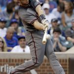Arizona Diamondbacks' Paul Goldschmidt hits a three-run home run against the Chicago Cubs during the first inning of a baseball game Thursday, Aug. 3, 2017, in Chicago. (AP Photo/Nam Y. Huh)