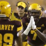 Arizona State running back Kalen Ballage celebrates with wide receiver Jalen Harvey (89) after Harvey scored a touchdown against New Mexico State during the first half of an NCAA college football game, Thursday, Aug. 31, 2017, in Tempe, Ariz. (AP Photo/Rick Scuteri)