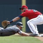 Arizona Diamondbacks' A.J. Pollock, left, beats the throw to Minnesota Twins first baseman Mitch Garver as he returns safely to first on a pickoff attempt in the first inning of a baseball game, Sunday, Aug. 20, 2017, in Minneapolis. (AP Photo/Jim Mone)