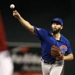 Chicago Cubs' Jake Arrieta, right, throws a pitch against Arizona Diamondbacks' David Peralta during the first inning of a baseball game Sunday, Aug 13, 2017, in Phoenix. (AP Photo/Ross D. Franklin)