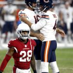 Chicago Bears kicker Connor Barth (4) and punter Pat O'Donnell (16) celebrate a field goal as Arizona Cardinals cornerback Justin Bethel (28) gets up during the first half of a preseason NFL football game, Saturday, Aug. 19, 2017, in Glendale, Ariz. (AP Photo/Ross D. Franklin)