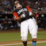 Arizona Diamondbacks' Adam Rosales reacts after being called out on strikes against the San Francisco Giants during the seventh inning of a baseball game Saturday, Aug. 26, 2017, in Phoenix. (AP Photo/Ross D. Franklin)
