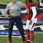 Former St. Louis Rams and Arizona Cardinals quarterback Kurt Warner, left, greets Cardinals wide receiver Larry Fitzgerald before the Pro Football Hall of Fame NFL preseason game in Canton, Ohio, Thursday, Aug. 3, 2017. Warner is to be inducted into the Hall of Fame later this month. (AP Photo/Ron Schwane)