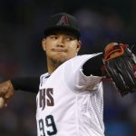 Arizona Diamondbacks' Taijuan Walker throws a pitch against the Chicago Cubs during the first inning of a baseball game Friday, Aug 11, 2017, in Phoenix. (AP Photo/Ross D. Franklin)