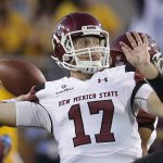 New Mexico State's Tyler Rogers (17) warms up before a football game against Arizona State, Thursday, Aug. 31, 2017, in Tempe, Ariz.. (AP Photo/Rick Scuteri)