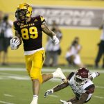 Arizona State wide receiver Jalen Harvey (89) carries the ball for a touchdown after a reception, in front of New Mexico State defensive back Austin Perkins during the first half of an NCAA college football game, Thursday, Aug. 31, 2017, in Tempe, Ariz. (AP Photo/Rick Scuteri)