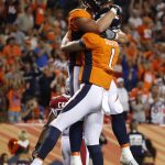 Denver Broncos tight end Steven Scheu (81) celebrates his touchdown catch against the Arizona Cardinals during the second half of an NFL preseason football game with quarterback Kyle Sloter (1), Thursday, Aug. 31, 2017, in Denver. (AP Photo/Jack Dempsey)