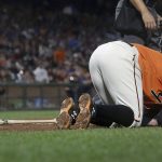 San Francisco Giants' Brandon Belt reacts after being hit by a pitch during the sixth inning of the team's baseball game against the Arizona Diamondbacks in San Francisco, Friday, Aug. 4, 2017. (AP Photo/Jeff Chiu)