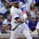 Chicago Cubs' Willson Contreras hits a two RBI single against the Arizona Diamondbacks during the seventh inning of a baseball game Thursday, Aug. 3, 2017, in Chicago. (AP Photo/Nam Y. Huh)