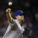 Chicago Cubs' John Lackey throws a pitch against the Arizona Diamondbacks during the first inning of a baseball game Friday, Aug 11, 2017, in Phoenix. (AP Photo/Ross D. Franklin)