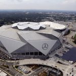 The new Mercedes-Benz Stadium is seen in an aerial photo before an NFL preseason football game between the Atlanta Falcons and the Arizona Cardinals, Saturday, Aug. 26, 2017, in Atlanta. (Akili-Casundria Ramsess/Atlanta Journal & Constitution via AP)