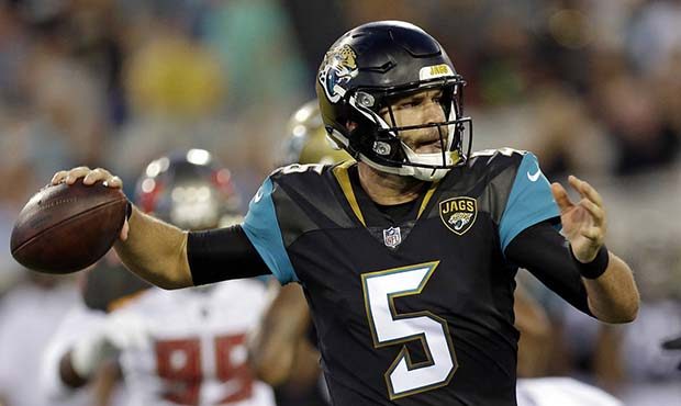 Jacksonville Jaguars quarterback Blake Bortles (5) throws a pass for a first down against the Tampa...