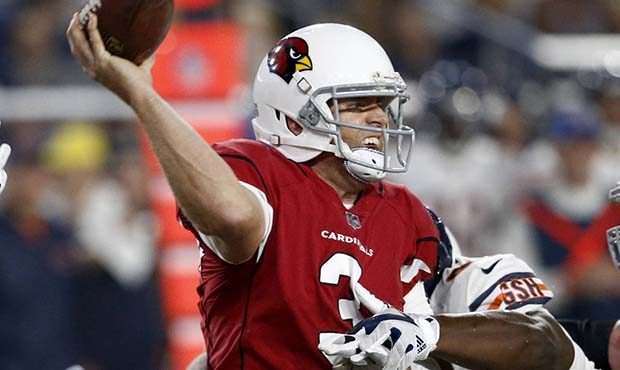 Arizona Cardinals quarterback Carson Palmer (3) throw under pressure against the Chicago Bears duri...