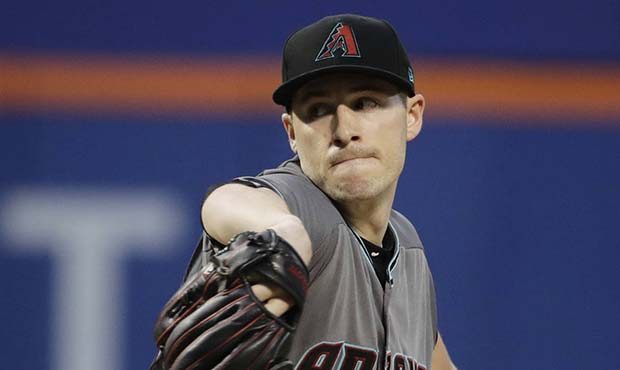 Arizona Diamondbacks' Patrick Corbin delivers a pitch during the first inning of a baseball game ag...