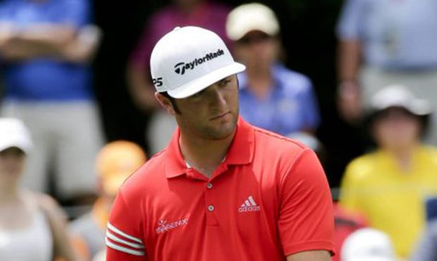 Jon Rahm, of Spain, watches his putt on the eighth hole during the final round of the PGA Champions...