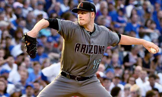 Arizona Diamondbacks starting pitcher Patrick Corbin (46) delivers during the first inning of a bas...