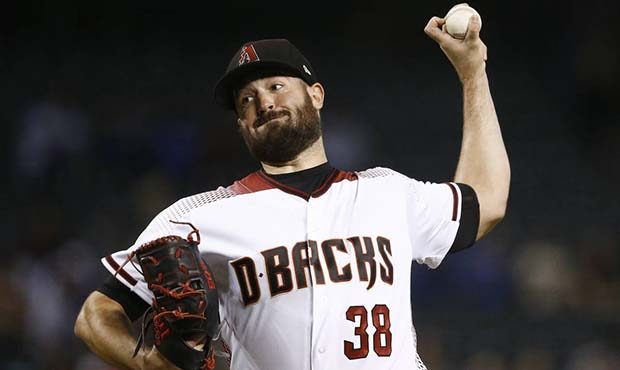 Arizona Diamondbacks' Robbie Ray throws a pitch to a Los Angeles Dodgers batter during the first in...